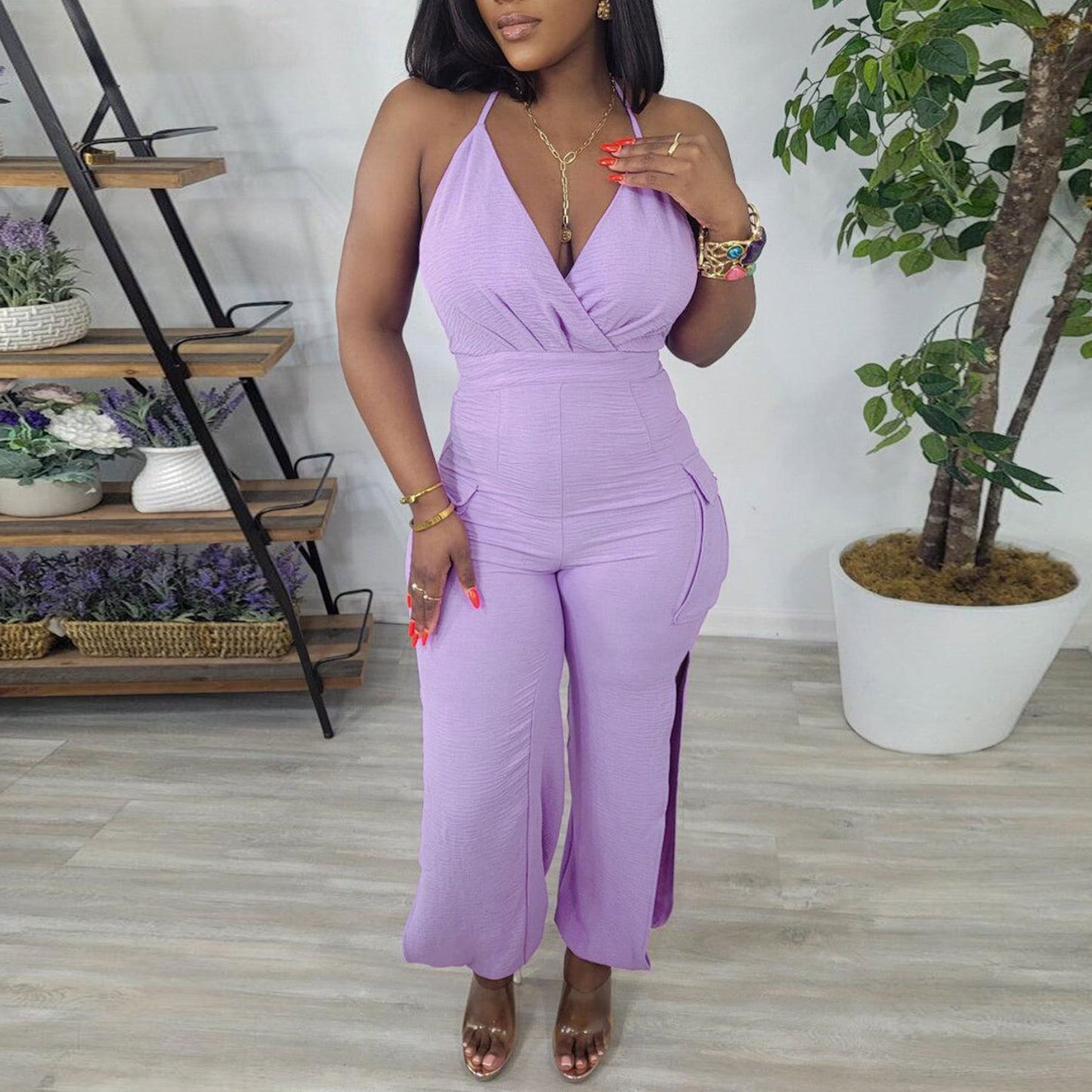 Solid color sling halter neck hollow hip-wrapped jumpsuit